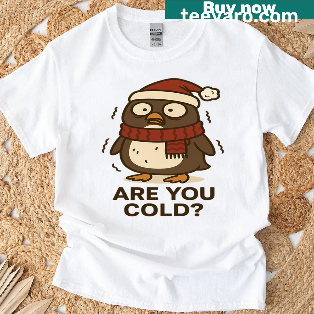 Playful penguin graphic with text 'Are You Cold?' on T-shirt — on a men's t-shirt
