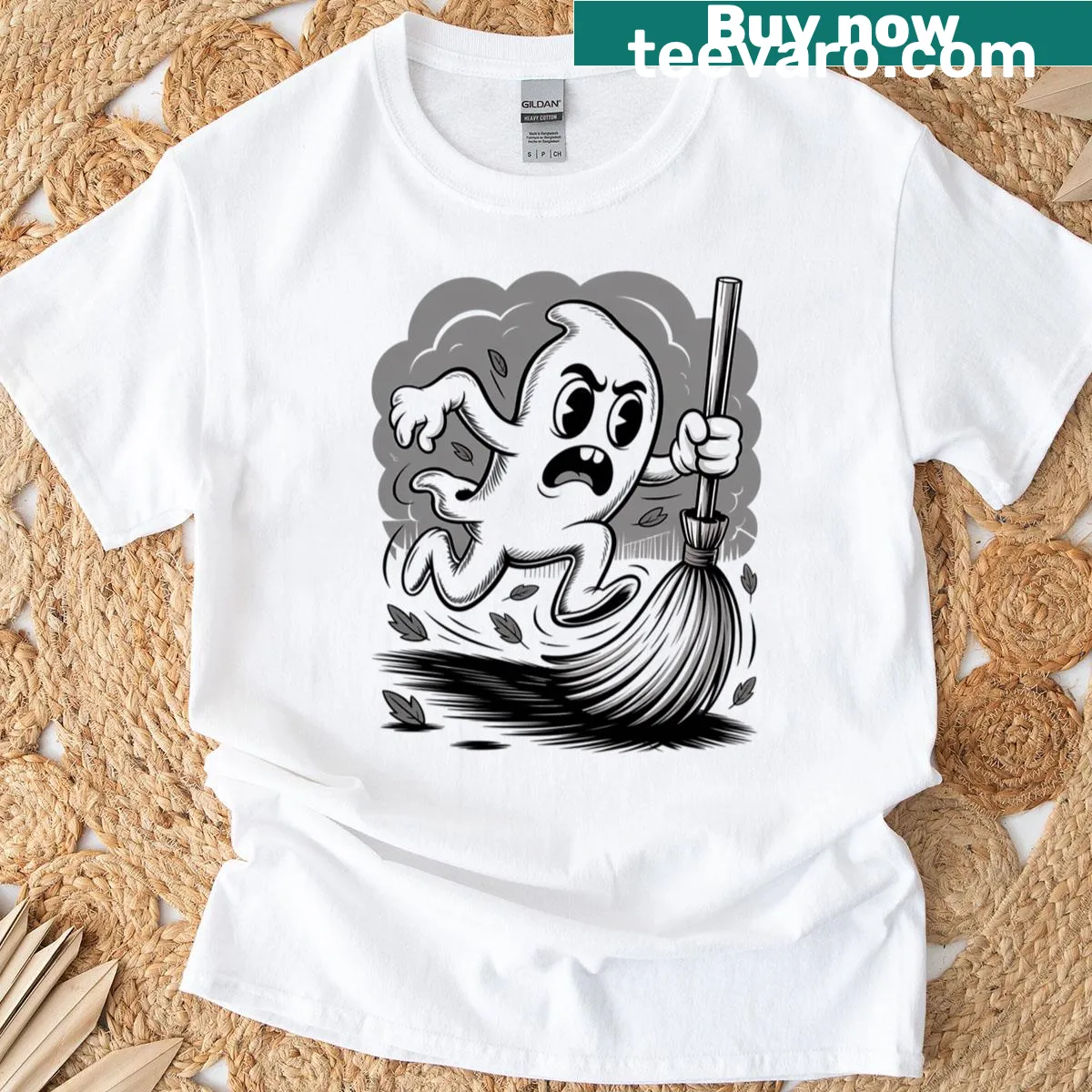 Oversized T-shirt with a cartoon ghost and broom graphic — on a men's t-shirt