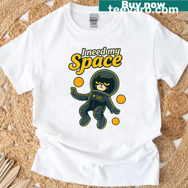 Grumpy black cat in astronaut suit graphic on T-shirt