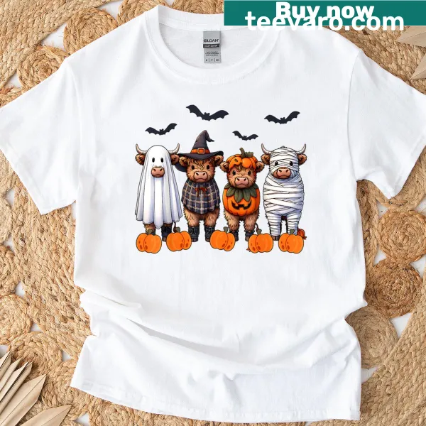 Halloween-themed t-shirt with a Highland cow and spooky elements