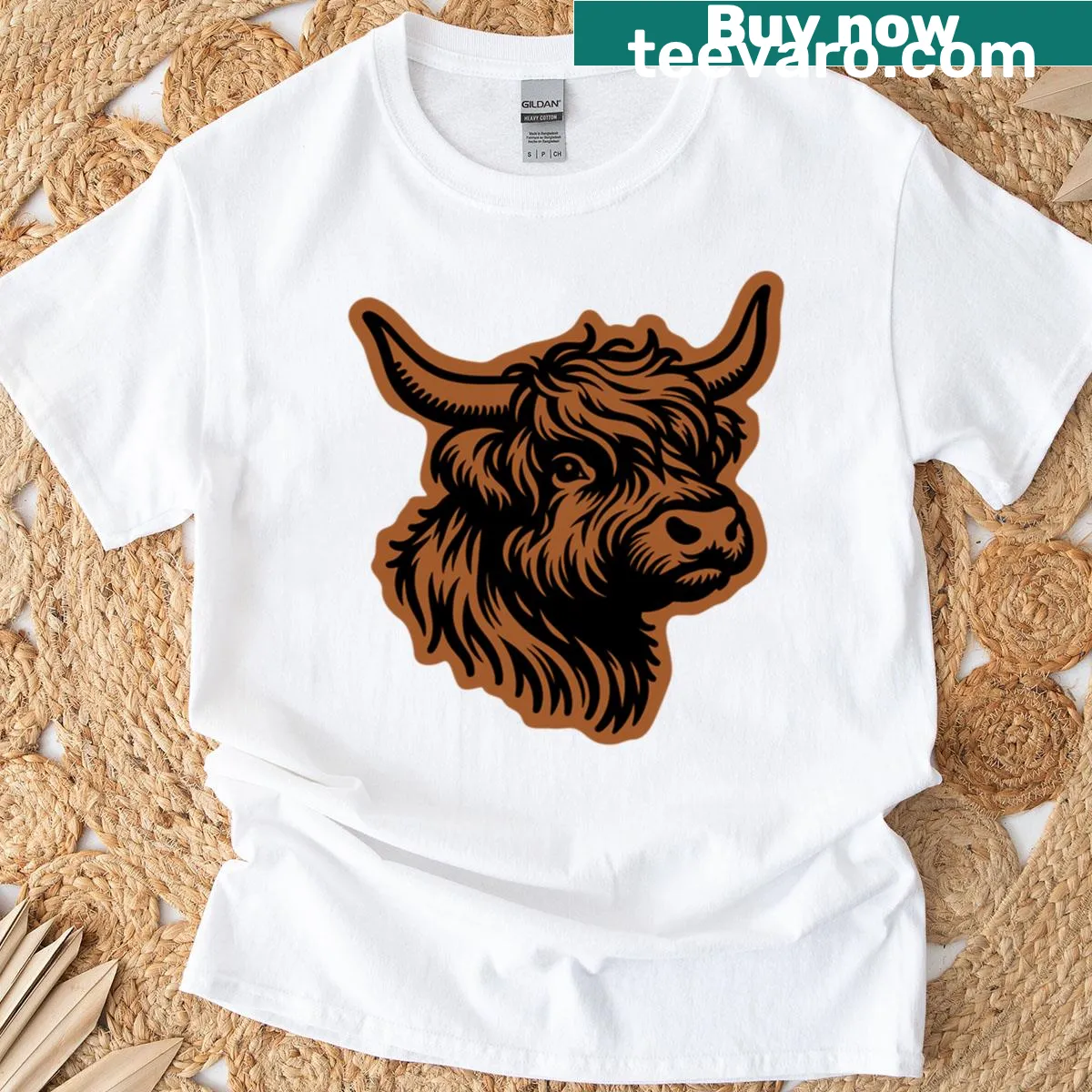 T-shirt featuring a Highland cow graphic — on a men's t-shirt