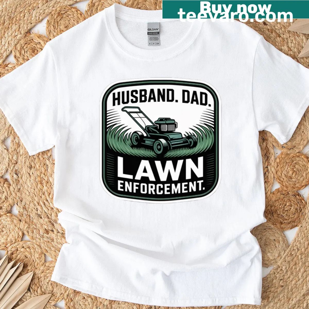 Humorous t-shirt for dads featuring 'Husband Dad Lawn Enforcement' text — on a men's t-shirt