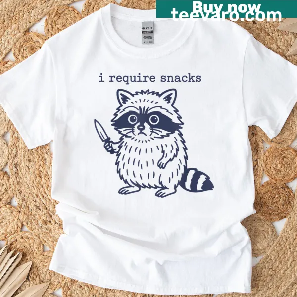 Funny T-shirt featuring a playful phrase about snacks and raccoons.