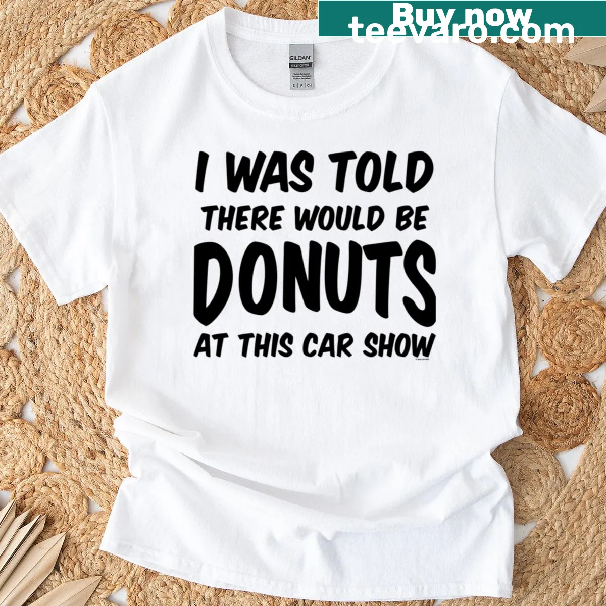Oversized T-shirt featuring a humorous phrase about donuts and car shows. — on a men's t-shirt