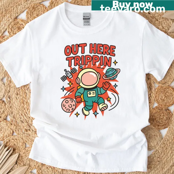 Illustrated astronaut graphic on a playful space-themed t-shirt