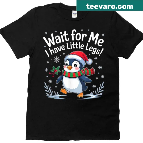 Cute Christmas T-shirt with penguin illustration and playful text