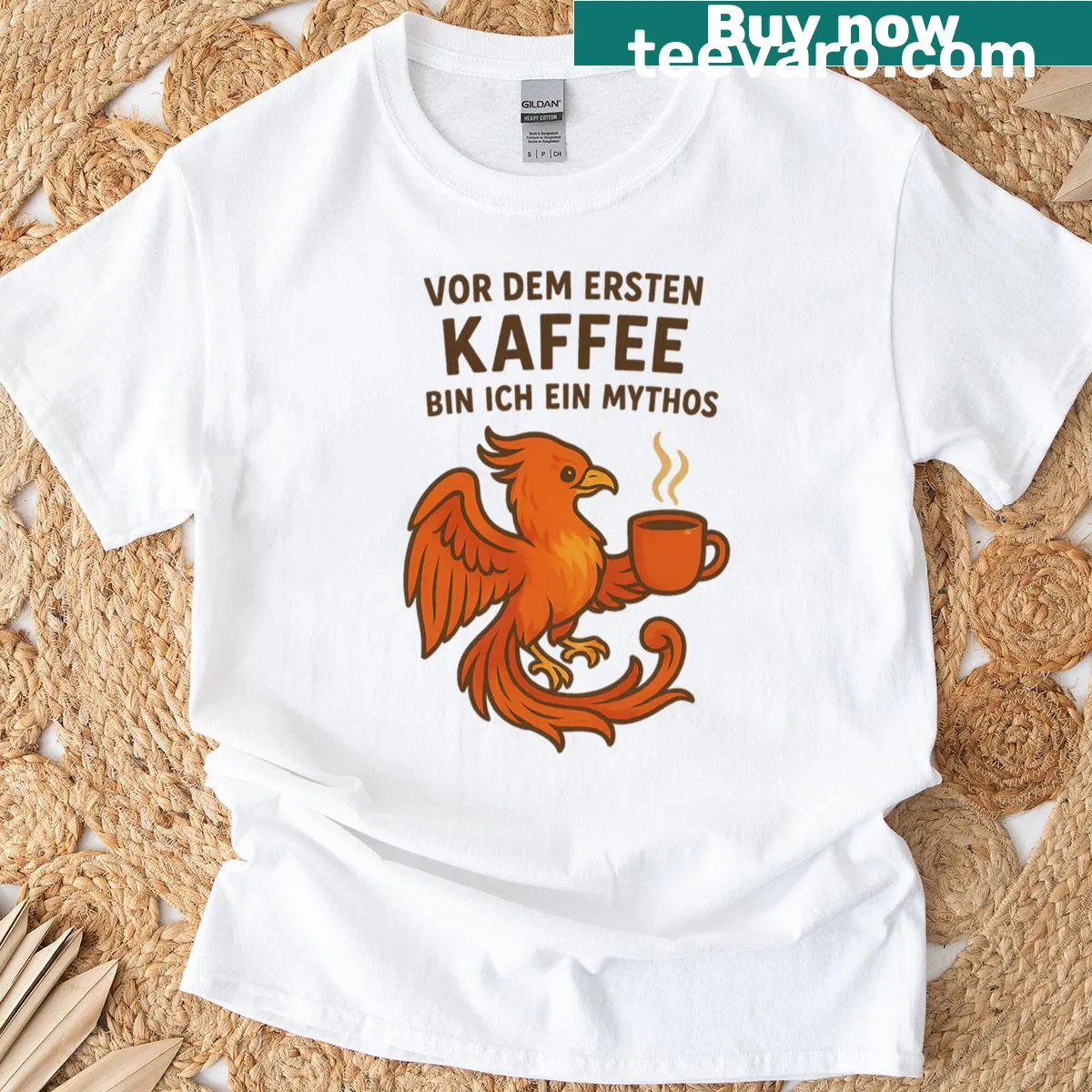 Illustration of a phoenix alongside a steaming cup of coffee — on a men's t-shirt