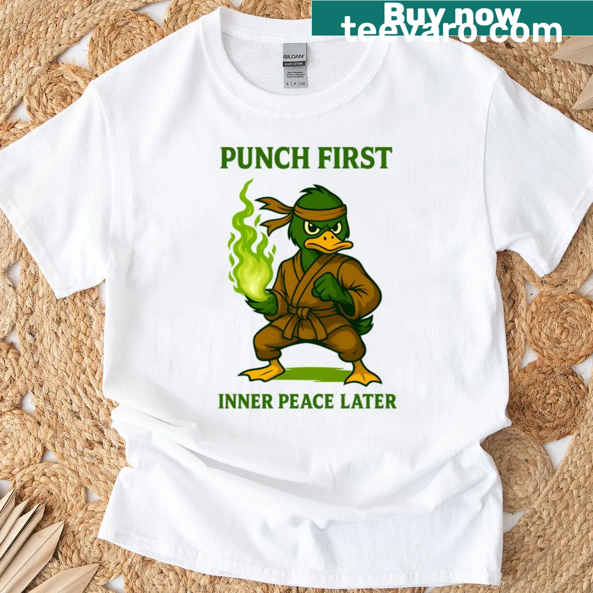 Edgy martial arts t-shirt with Punch First Inner Peace Later text — on a men's t-shirt