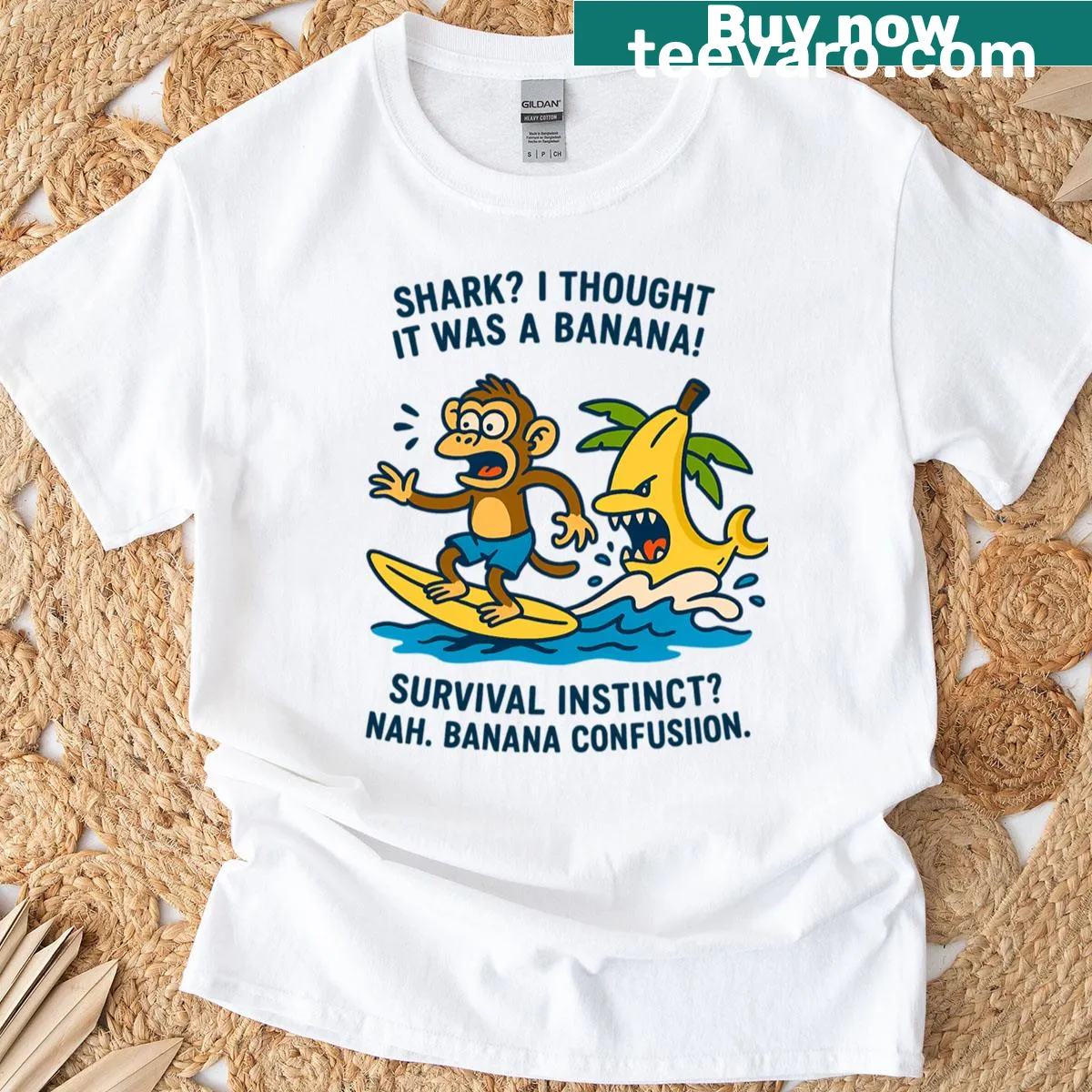 Cartoon T-shirt featuring a monkey surfing with a banana and a shark — on a men's t-shirt