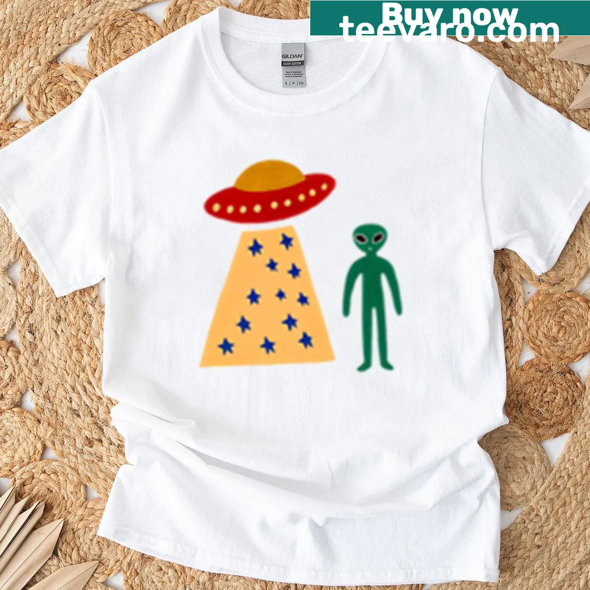 T-shirt featuring UFO and alien pick-up spot graphic — on a men's t-shirt