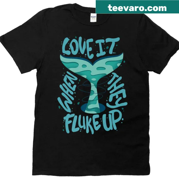 Illustrated t-shirt depicting a whale fluking up in the water.