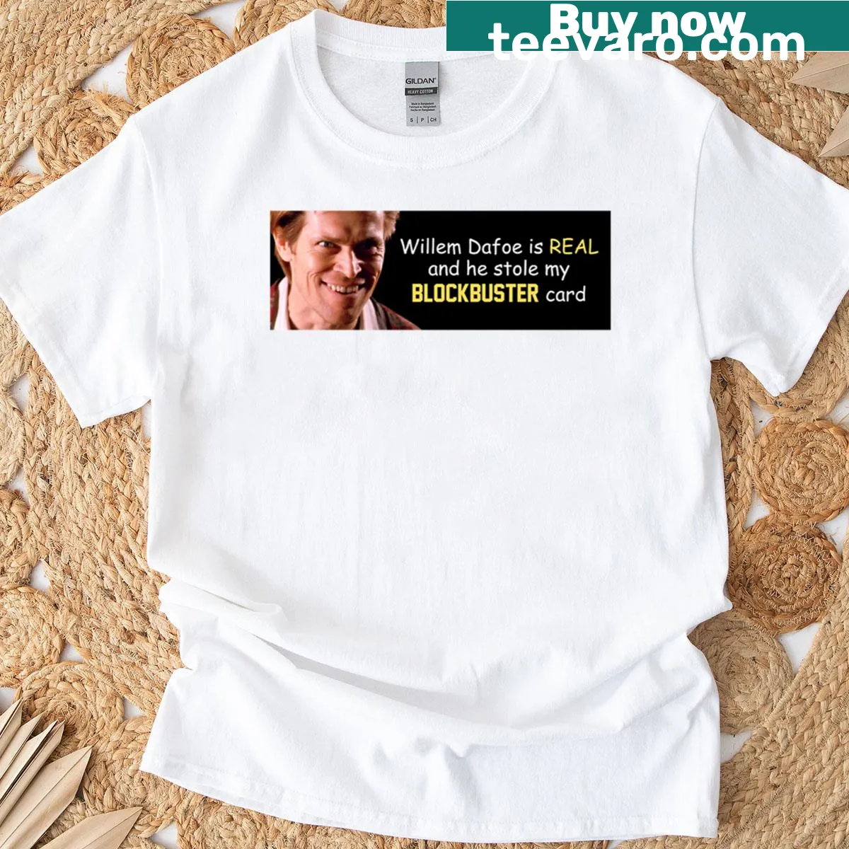 T-shirt featuring the phrase 'Willem Dafoe Stole My Blockbuster Card' — on a men's t-shirt