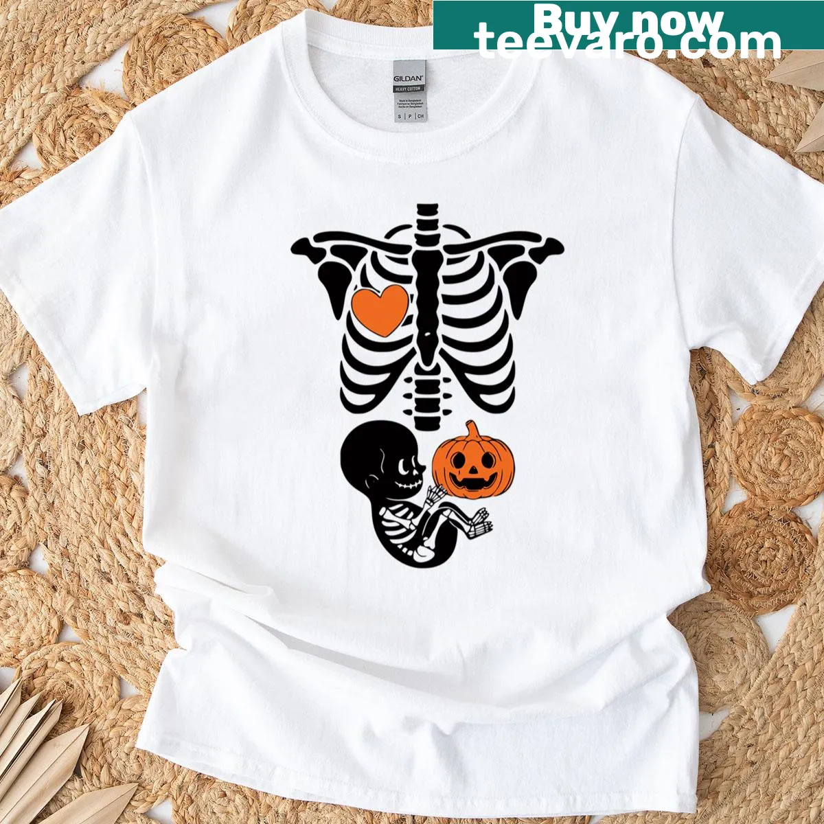 Funny Halloween maternity t-shirt with skeleton baby in pumpkin design — on a men's t-shirt