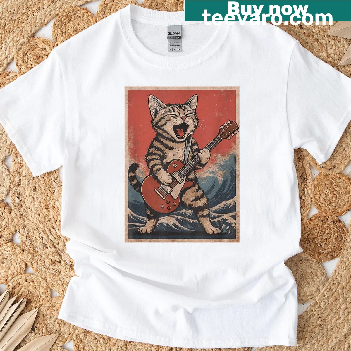 Distressed graphic of a cat playing guitar on a T-shirt — on a men's t-shirt