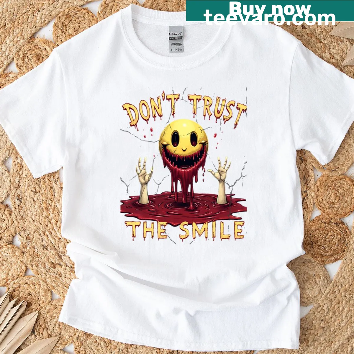 Oversized T-shirt featuring a creepy hands and smiley face design — on a men's t-shirt