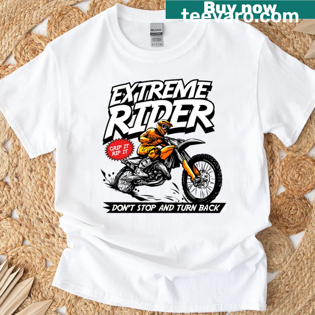 Bold motocross typography graphic on oversized t-shirt — on a men's t-shirt