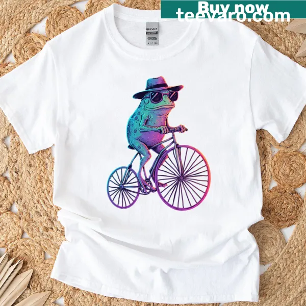 Cartoon frog riding a bicycle with sunglasses design on a T-shirt