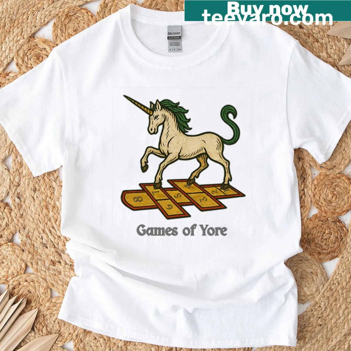 Oversized t-shirt with a medieval unicorn playing hopscotch illustration — on a men's t-shirt