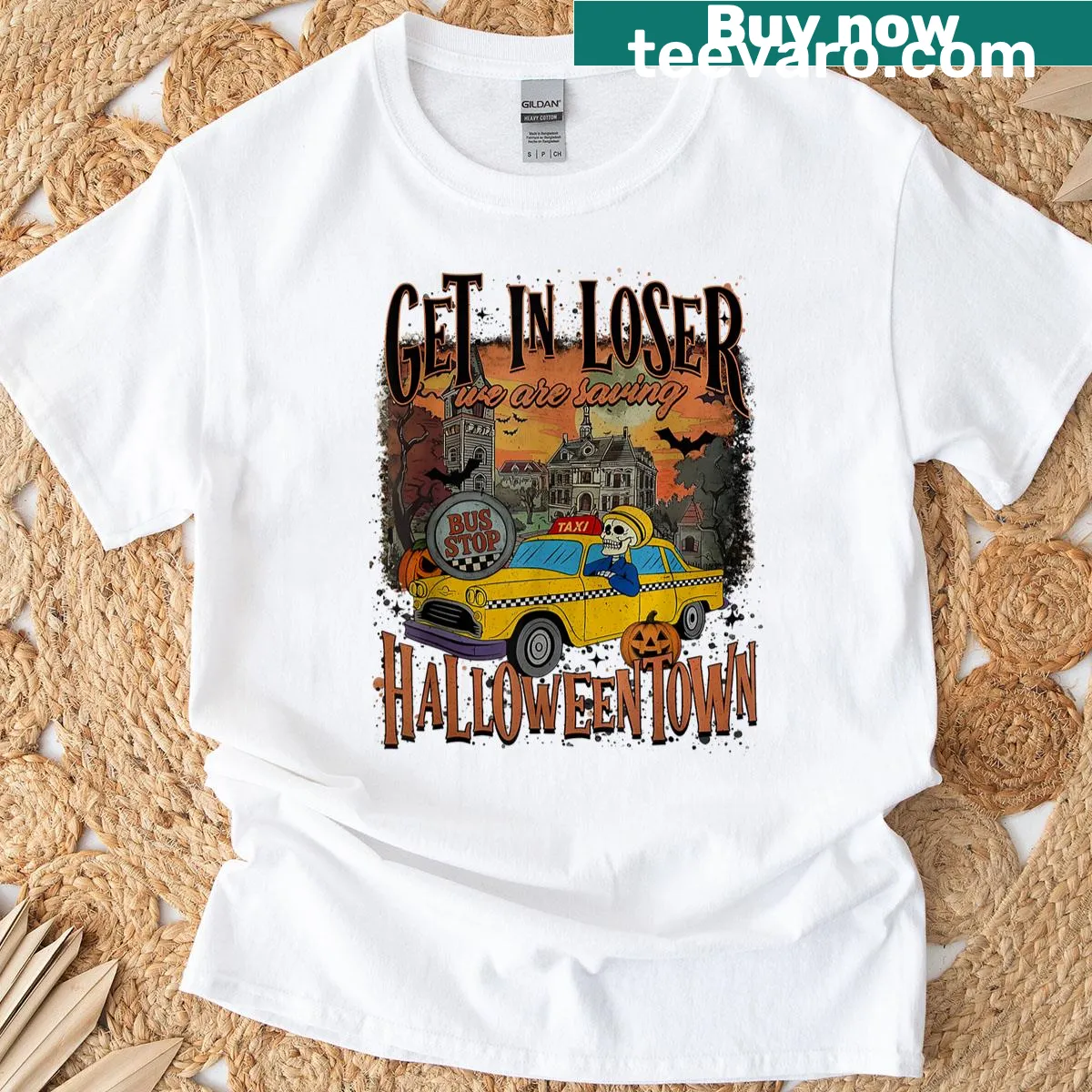 Playful graphic tee with a spooky town theme — on a men's t-shirt