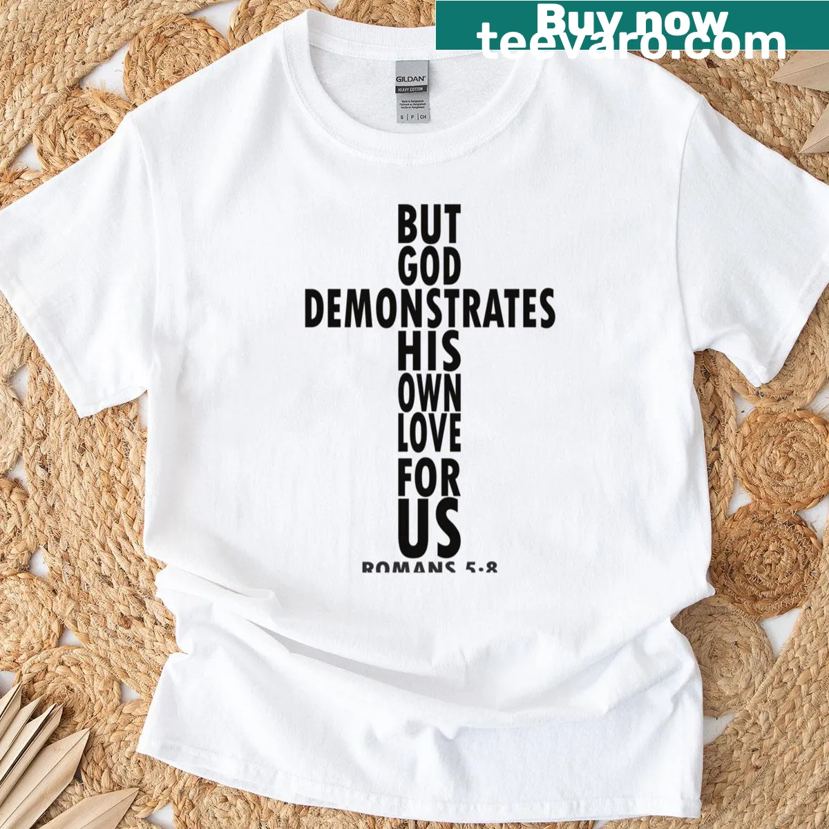 T-shirt featuring Romans 5:8 text about God's love — on a men's t-shirt