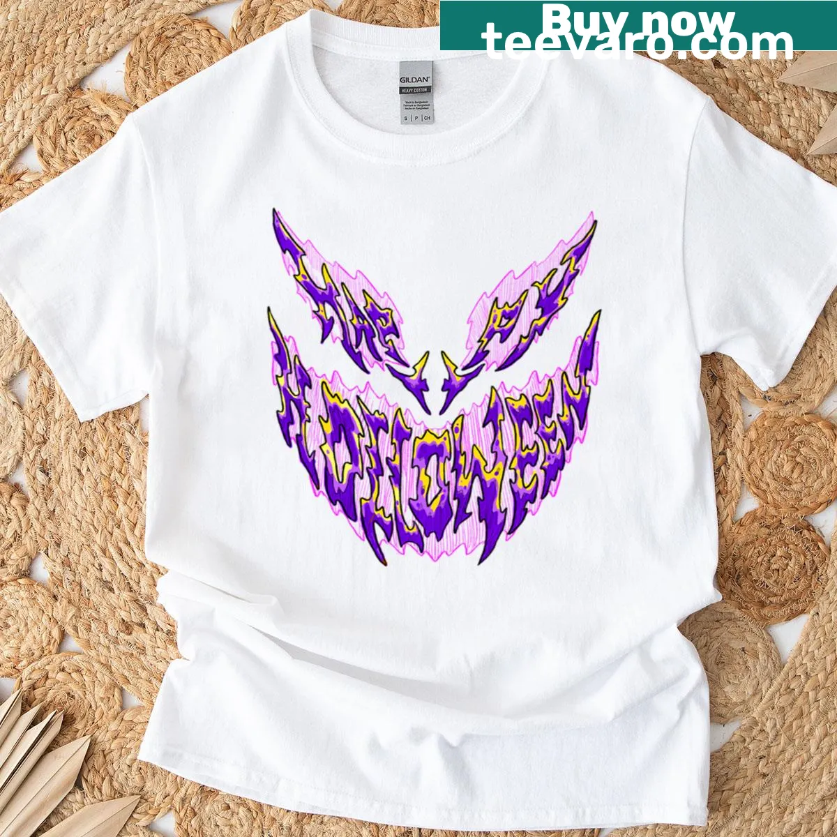 Happy Halloween T-shirt with a whimsical haunted graphic in purple. — on a men's t-shirt