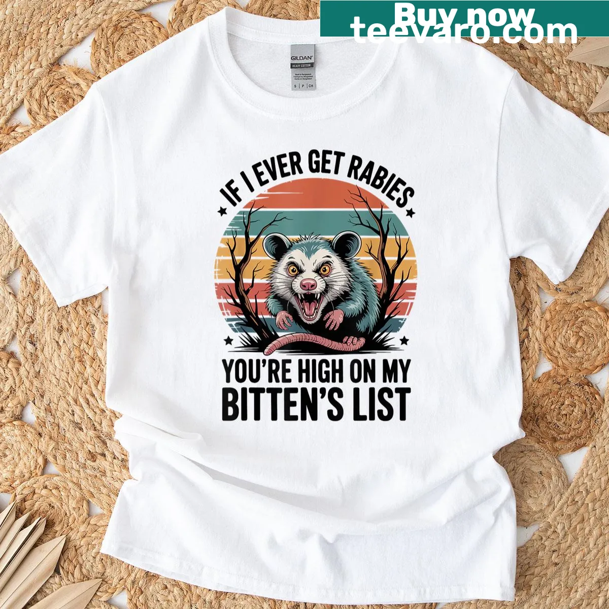 Humorous T-shirt with raccoon and biting list phrase — on a men's t-shirt