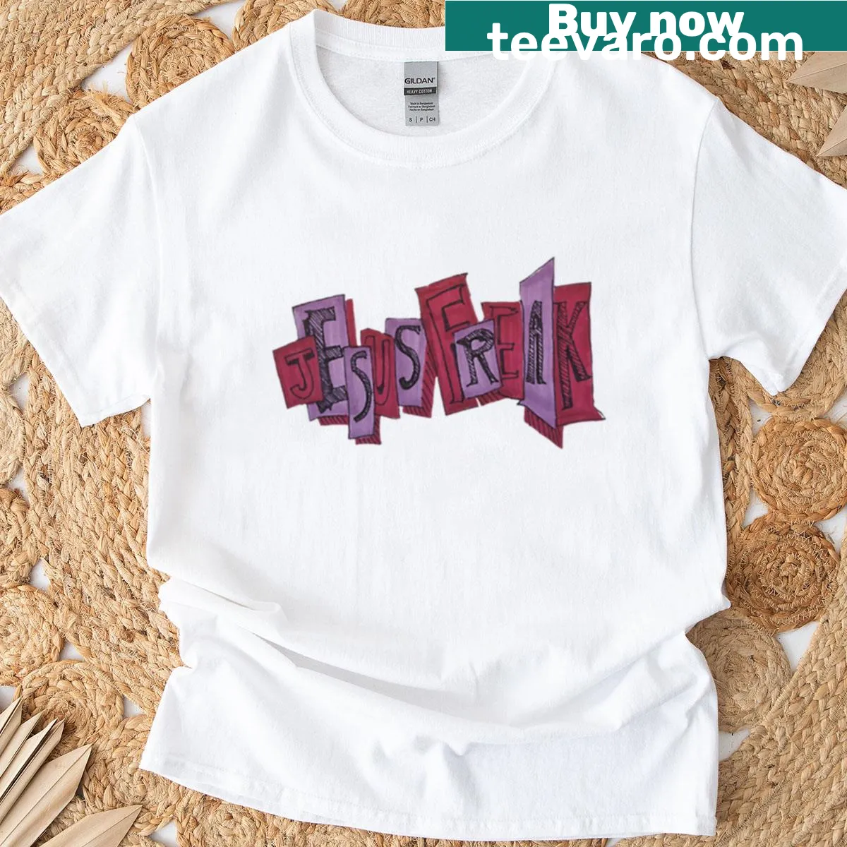 Bold typography t-shirt with the phrase Jesus Freak — on a men's t-shirt