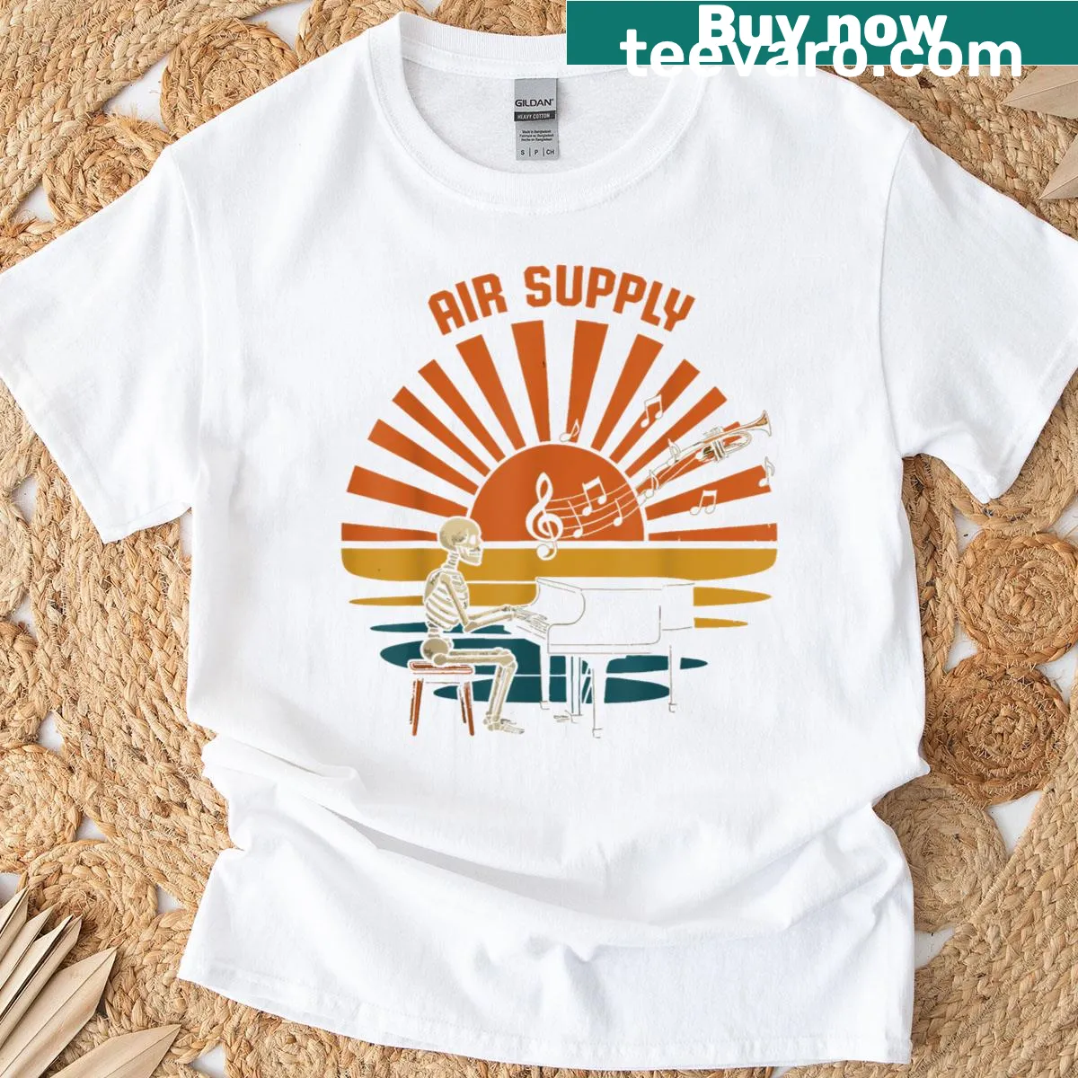Skeleton playing piano in a retro sunset graphic design. — on a men's t-shirt