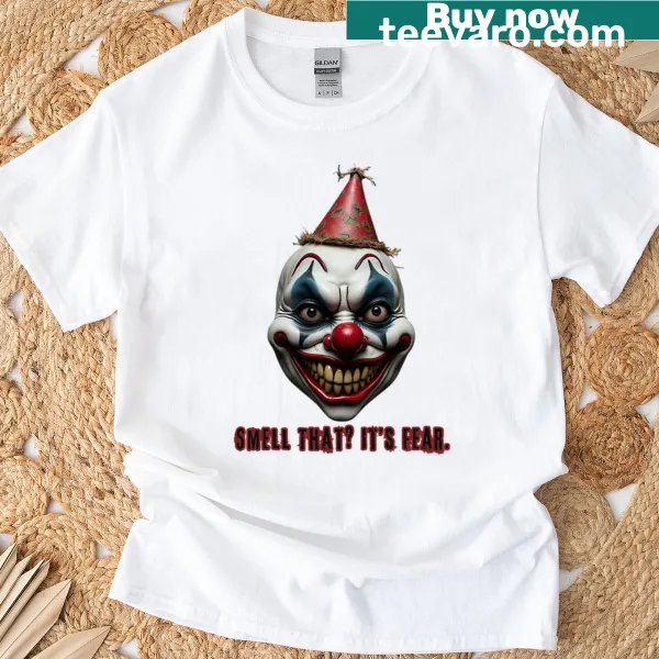 Scary white clown face graphic on a black T-shirt for Halloween