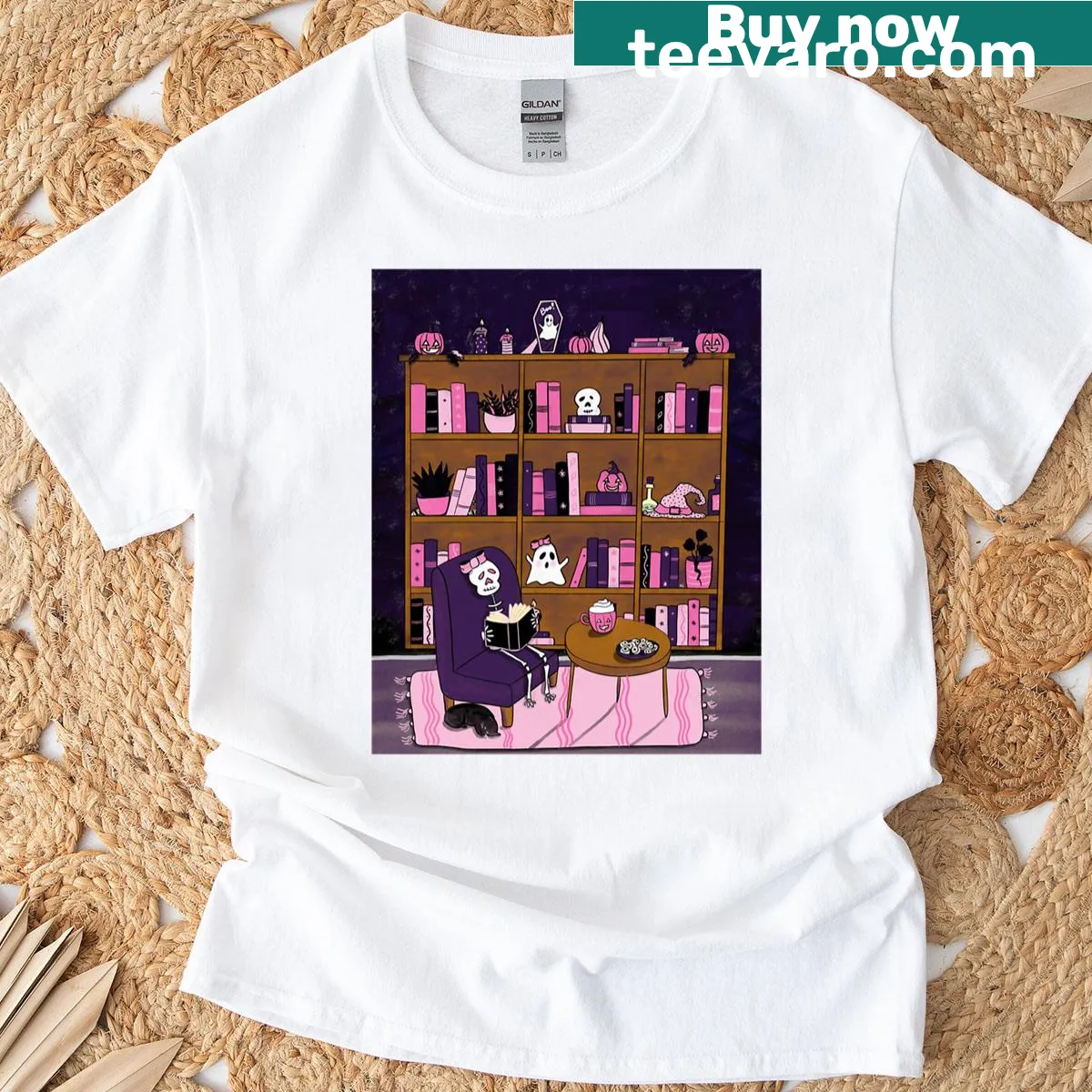 Skeleton reading a book in a spooky graphic design. — on a men's t-shirt