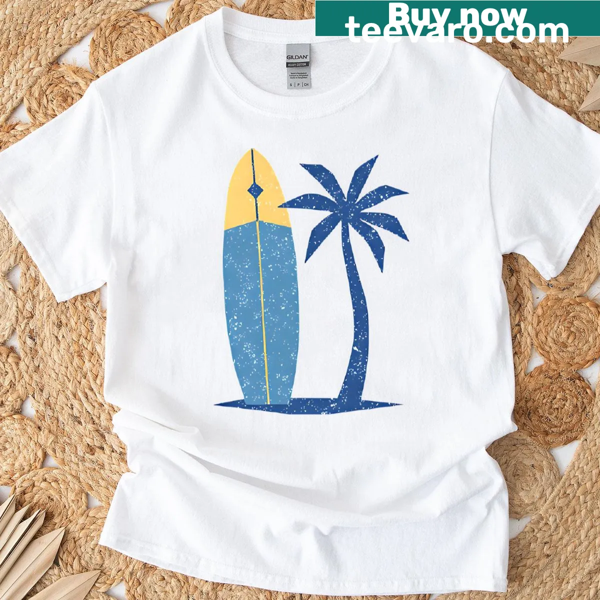 Minimalist t-shirt with a surfboard and palm tree silhouette — on a men's t-shirt