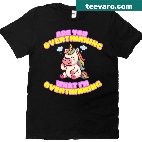 Kawaii unicorn caught in a rainbow mental spiral graphic on T-shirt