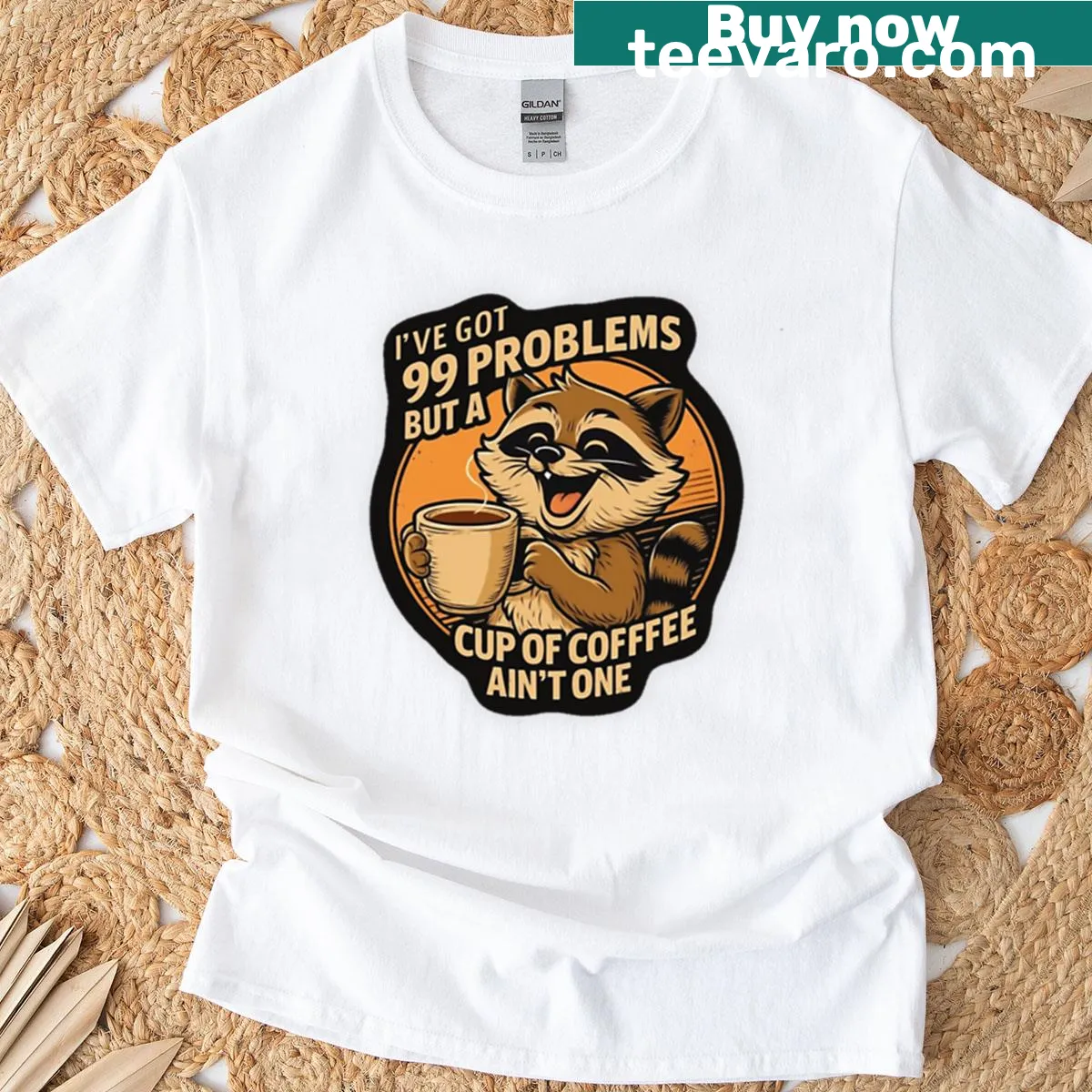Oversized T-shirt featuring a humorous raccoon coffee quote — on a men's t-shirt