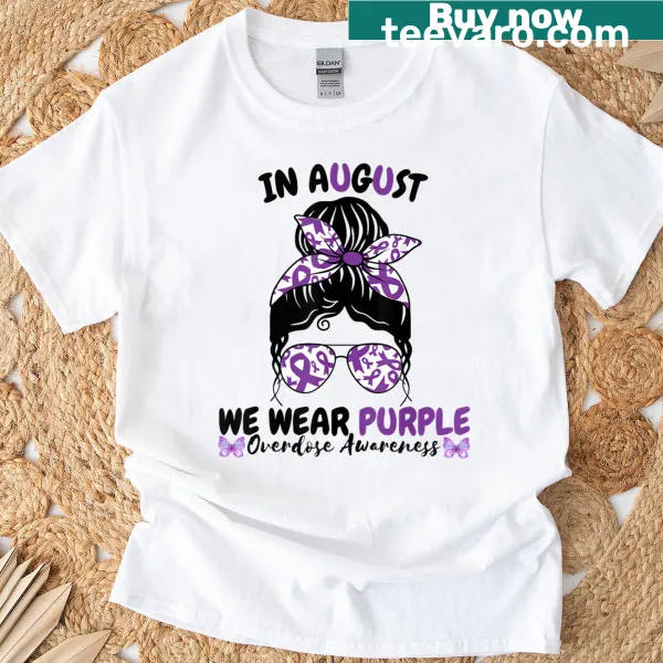 Awareness t-shirt with messy bun and ribbon design