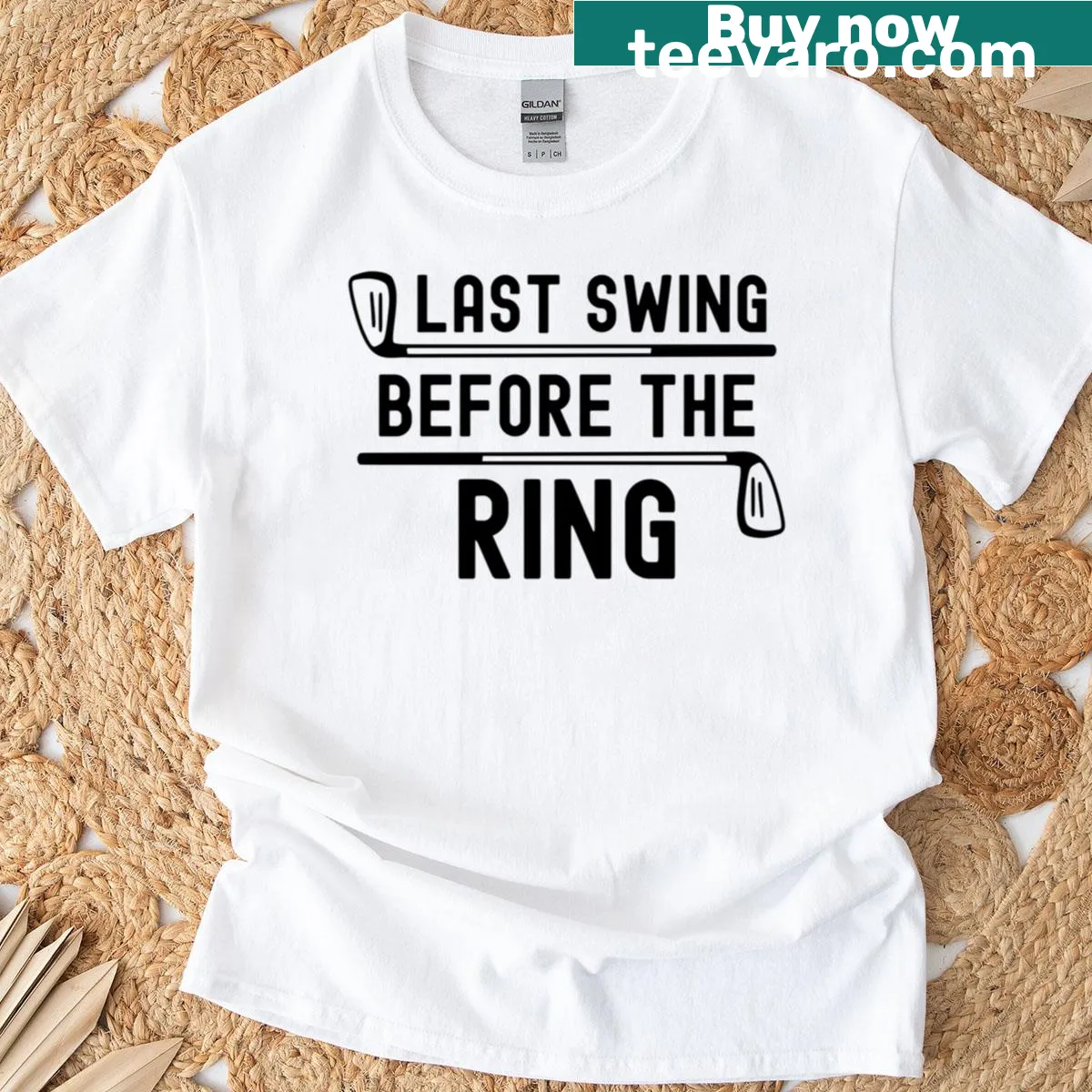 Oversized t-shirt featuring humorous golf text 'Last Swing Before The Ring'. — on a men's t-shirt