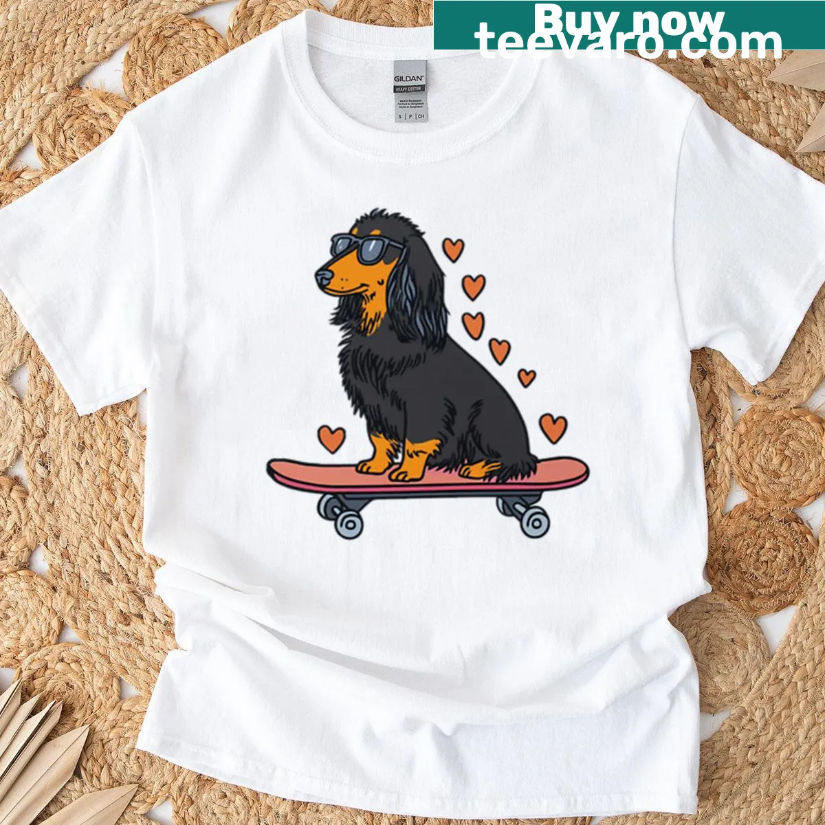 Illustration of a long-haired Dachshund on a skateboard with heart vibes — on a men's t-shirt