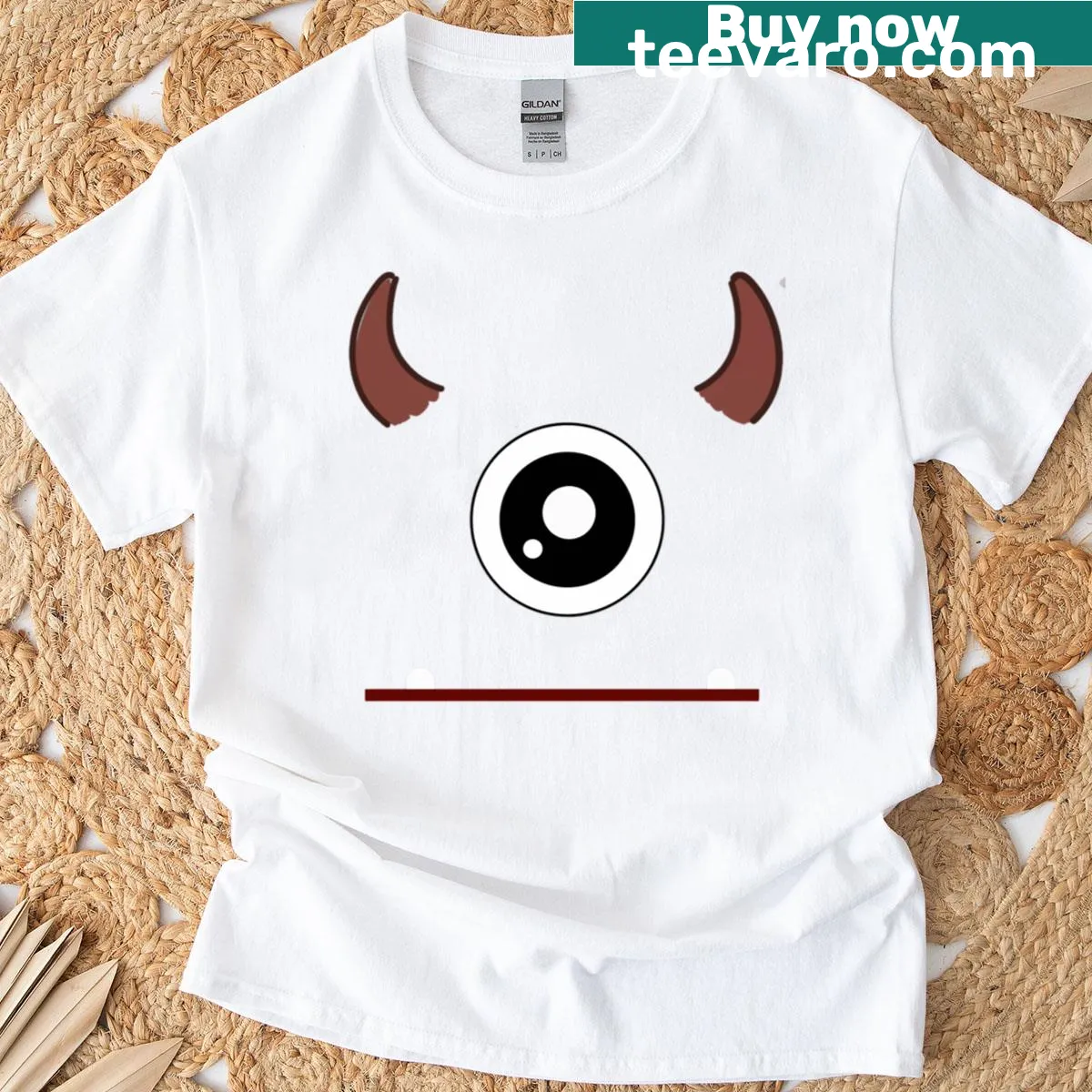Cute monster face design featuring oversized eyes and devil horns — on a men's t-shirt