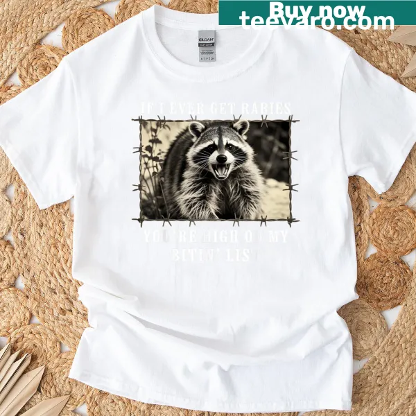 Funny raccoon graphic with a humorous saying on a t-shirt