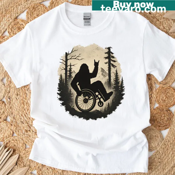 Vintage-style t-shirt featuring Bigfoot in a wheelchair illustration