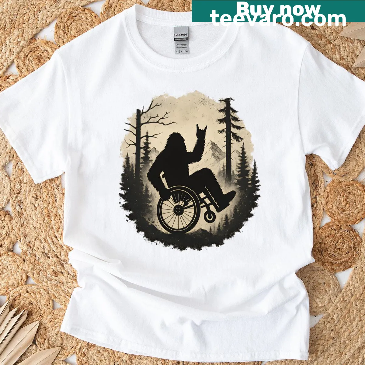 Vintage-style t-shirt featuring Bigfoot in a wheelchair illustration — on a men's t-shirt