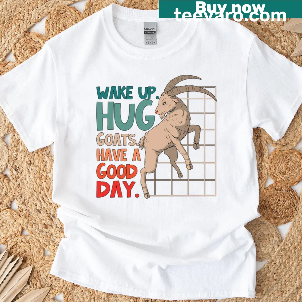 Shirt with 'Wake Up Hug Goats' text and farming illustration — on a men's t-shirt