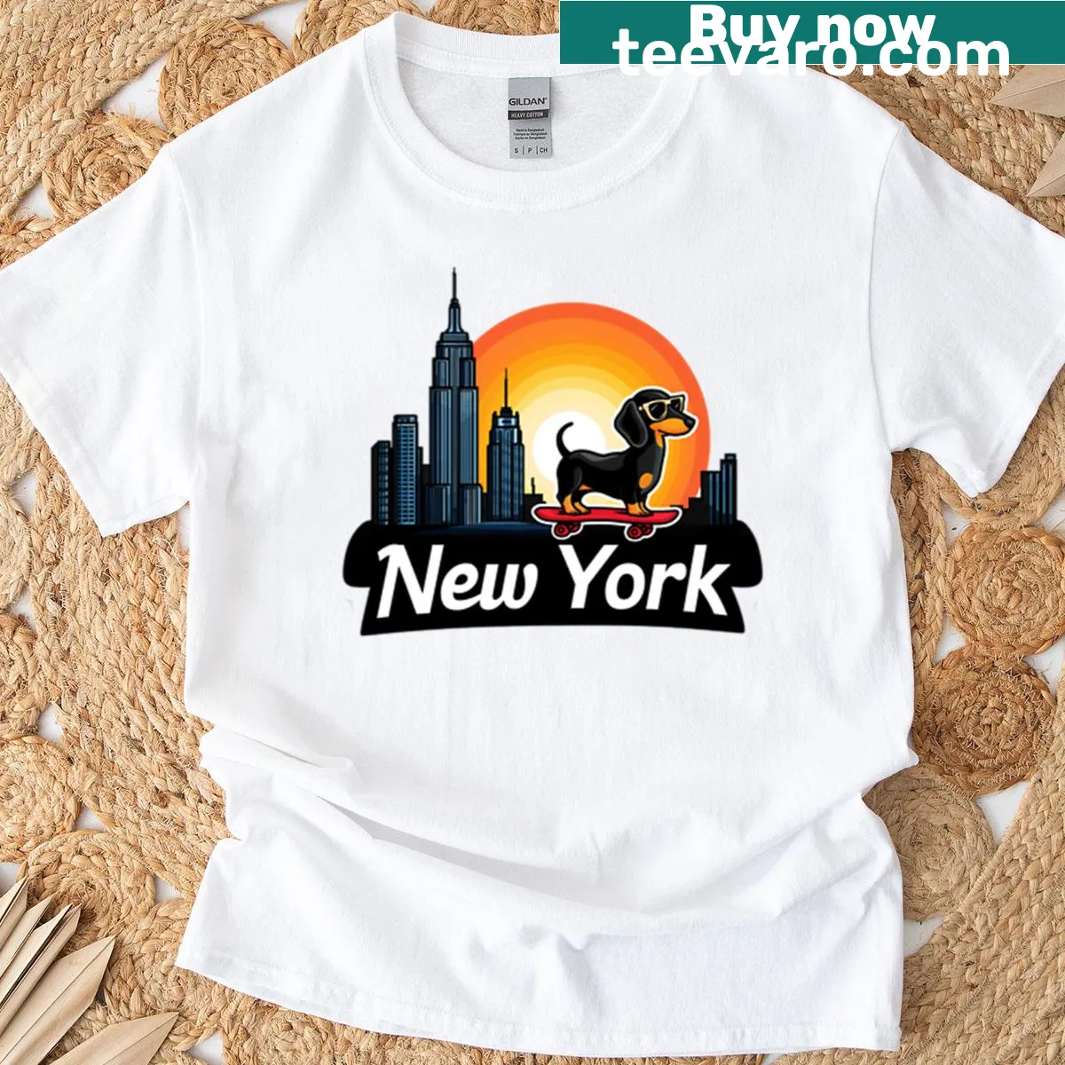 Illustrative tee featuring a skateboard dachshund against a sunset backdrop. — on a men's t-shirt