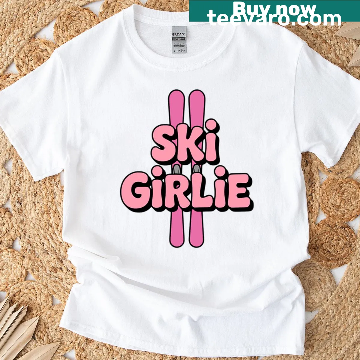 Pink T-shirt featuring a playful skiing graphic designed for women. — on a men's t-shirt