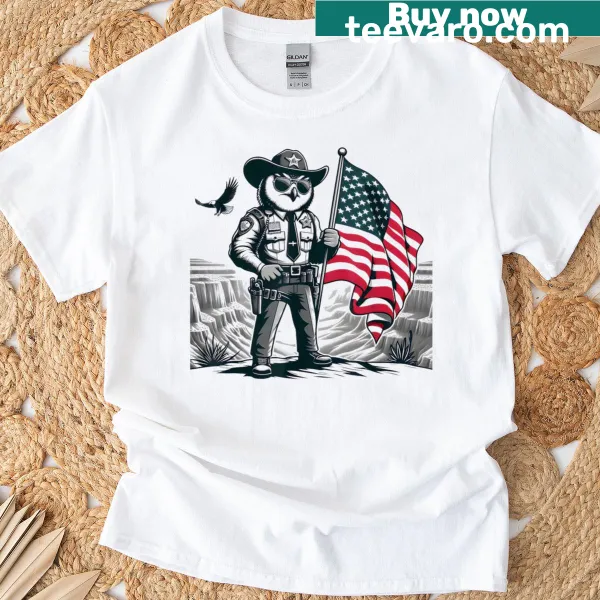 Vintage T-shirt with an owl in cowboy attire and American flag design