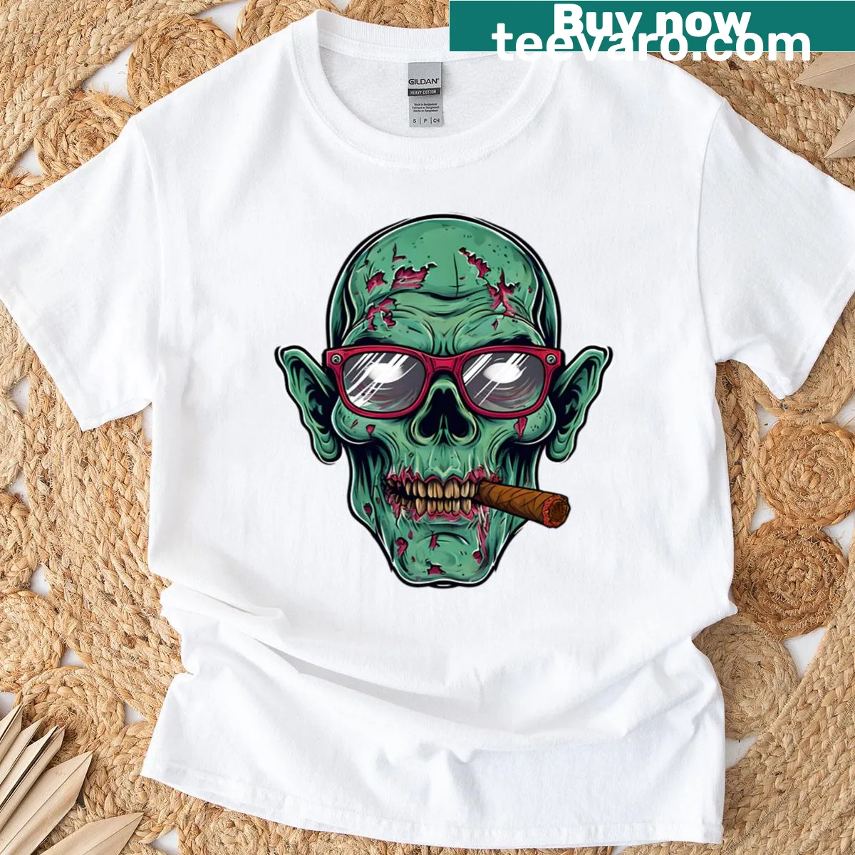 T-shirt featuring a zombie head with glasses and cigar illustration — on a men's t-shirt