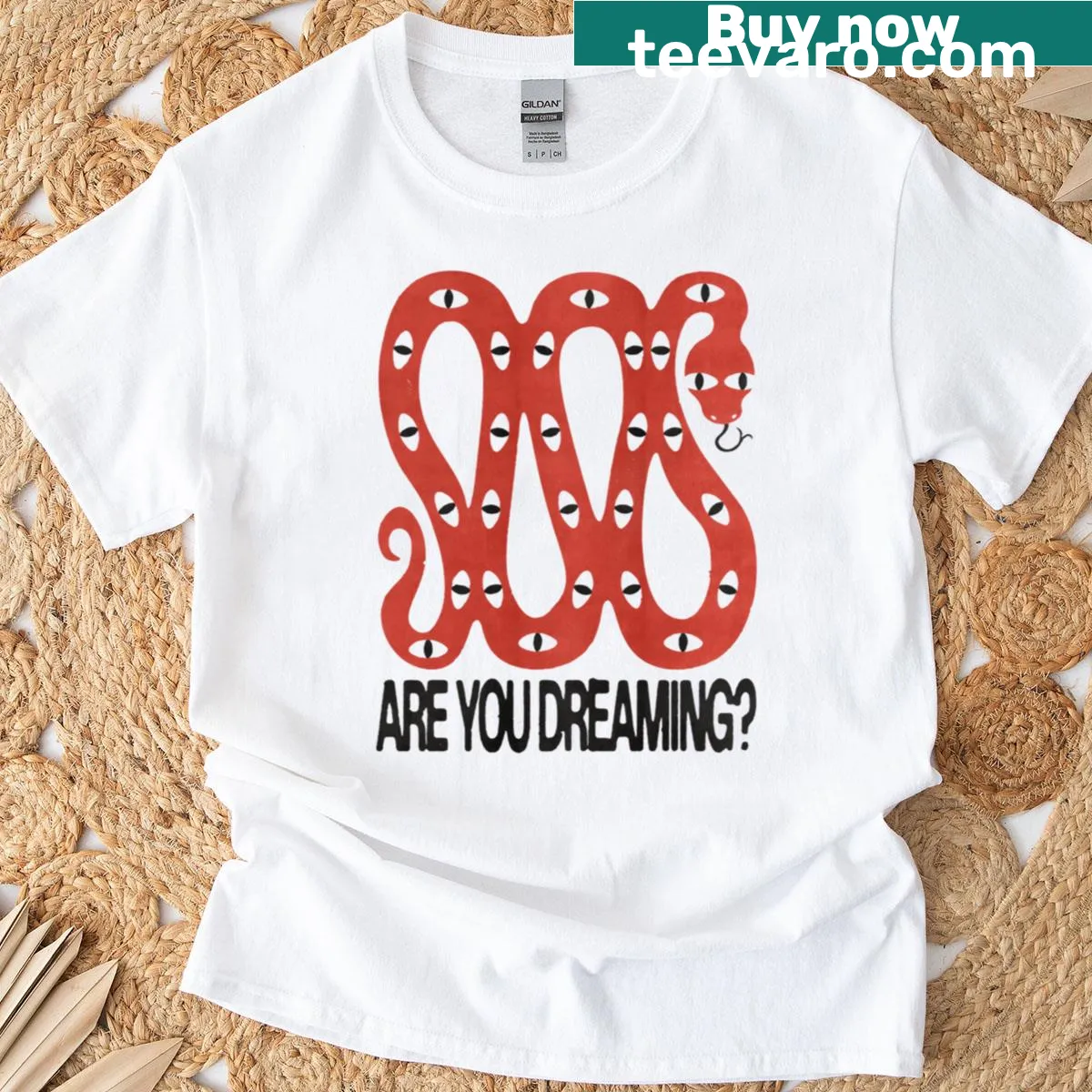Dreamy snake graphic T-shirt with whimsical cloud design — on a men's t-shirt