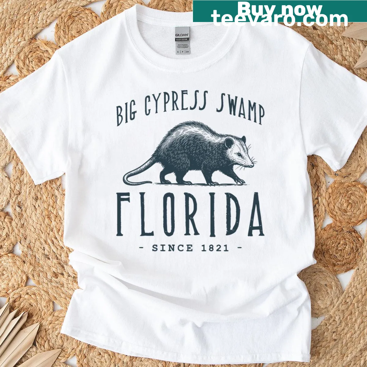 Vintage design T-shirt featuring a playful opossum from Big Cypress Swamp — on a men's t-shirt