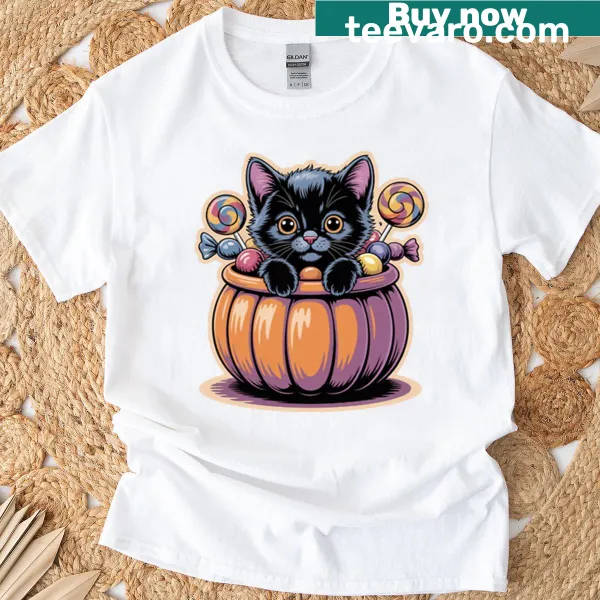 Illustration of a black kitten in a treat bucket on a T-shirt
