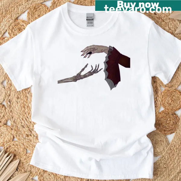 Dancing skeletons illustrated in a playful style on a t-shirt