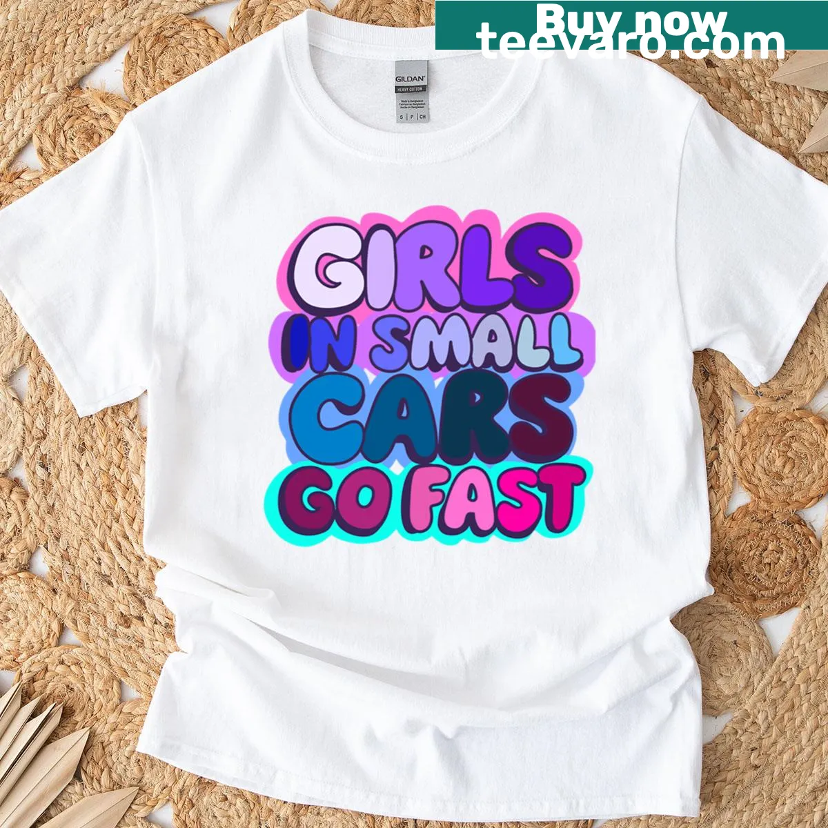 Oversized T-shirt with playful graphic of girls in small cars. — on a men's t-shirt